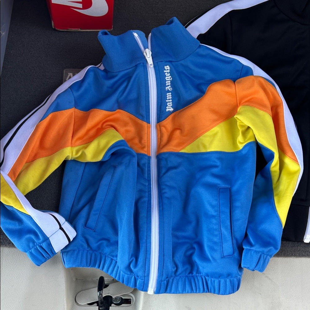 Palm Angels Blue Jacket with Orange and Yellow Accents